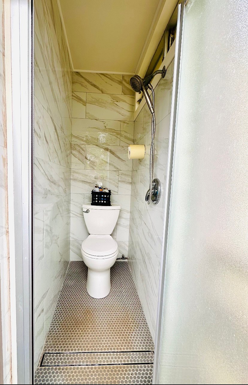 Half bathroom- toilet and shower