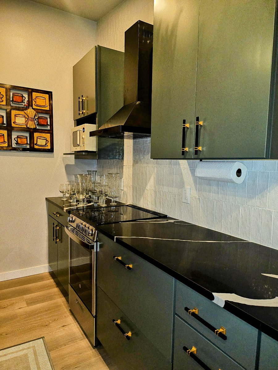 Modern kitchen offering ample cabinet storage and generous counter space.