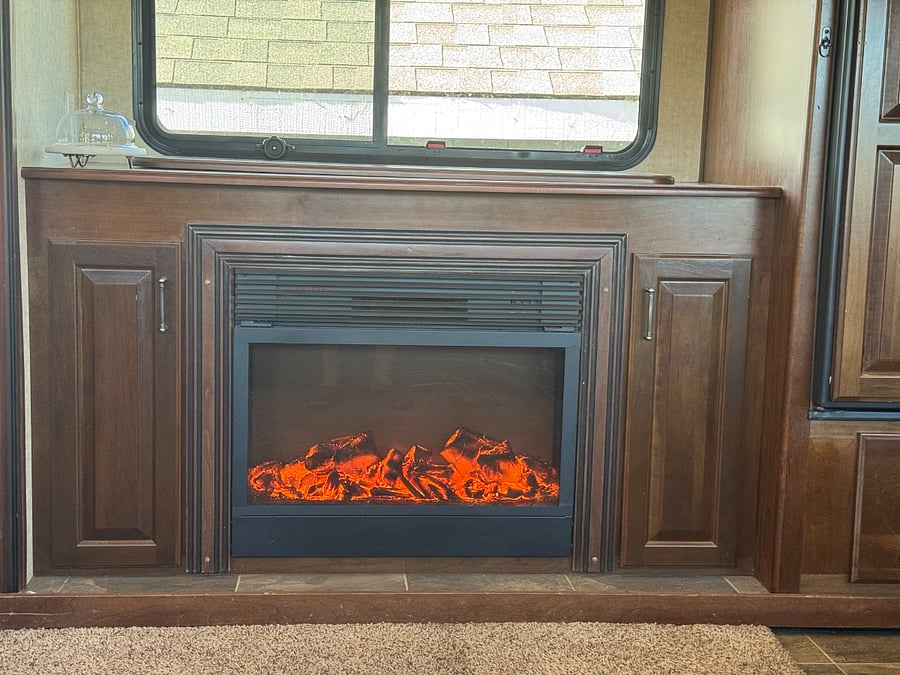 Electric fireplace under TV