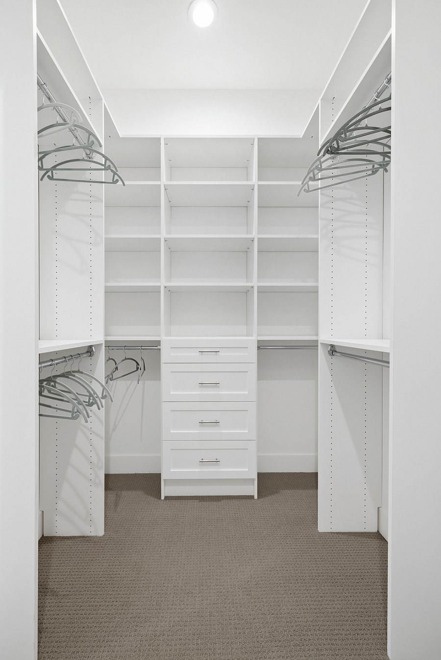 Walk in closet in primary room