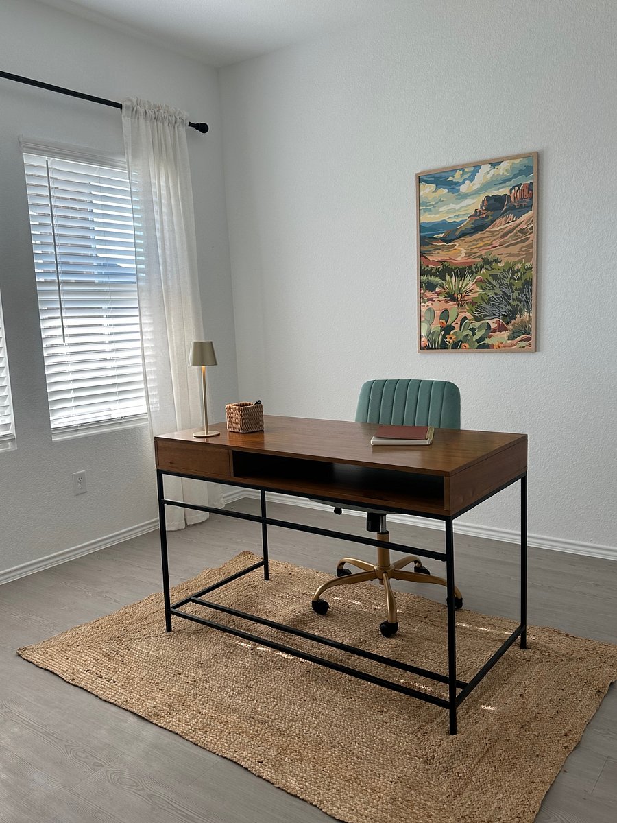 Dedicated office space with extra monitor.