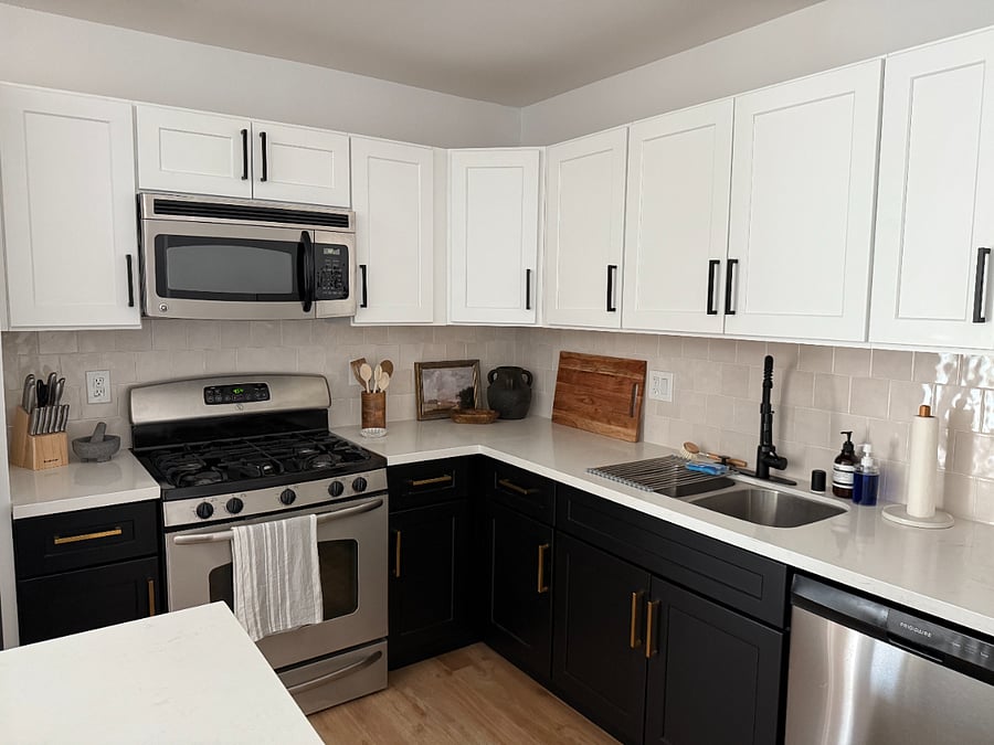 Fully stocked kitchen. Microwave, oven, dishwasher, utensils, blender, toaster, storage containers.
