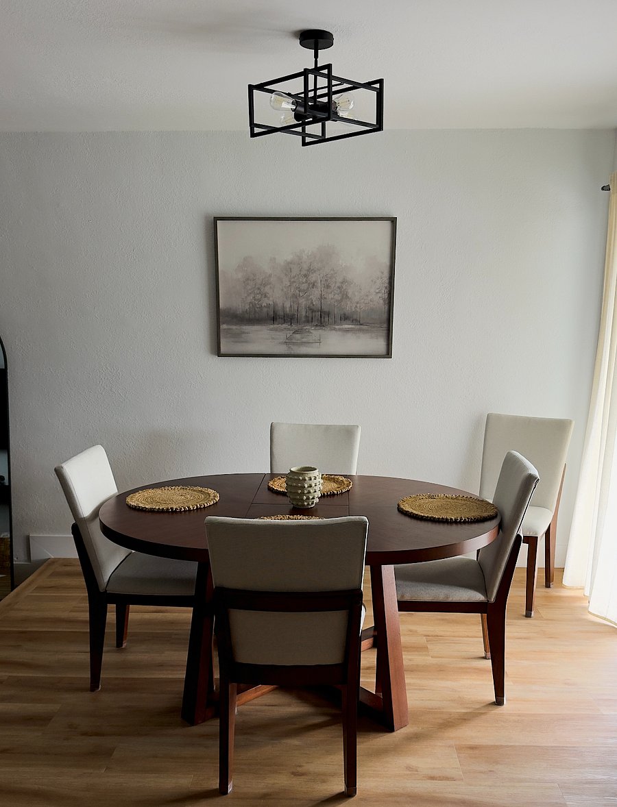 The table sits up to 6, 1 chair is stored in the office, 2nd chair is in the corner as shown in the image. 