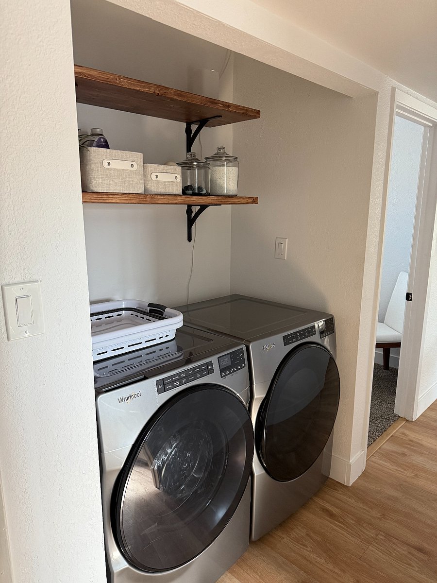 Washer and dryer, powder detergent is included for use.