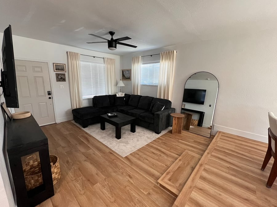 65 in TV, couch sits 4-6 people.