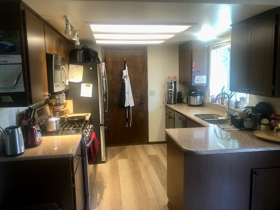 Fully stocked kitchen with pots, pans, dishware, silverware, and modern appliances of gas stove, oven, microwave, refrigerator, blender, & more (shared w/housemates)