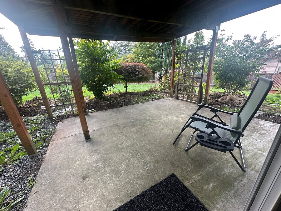 Private patio facing west, with entrance to the studio via the backyard
