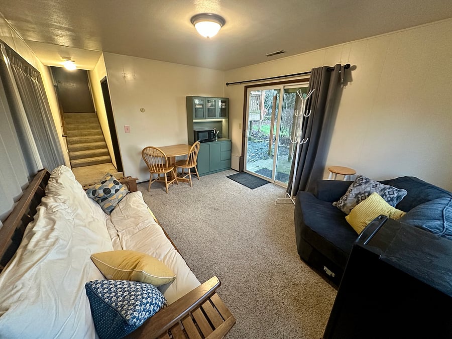 From the studio, short stairs lead up to the shared kitchen & dining spaces on the main level