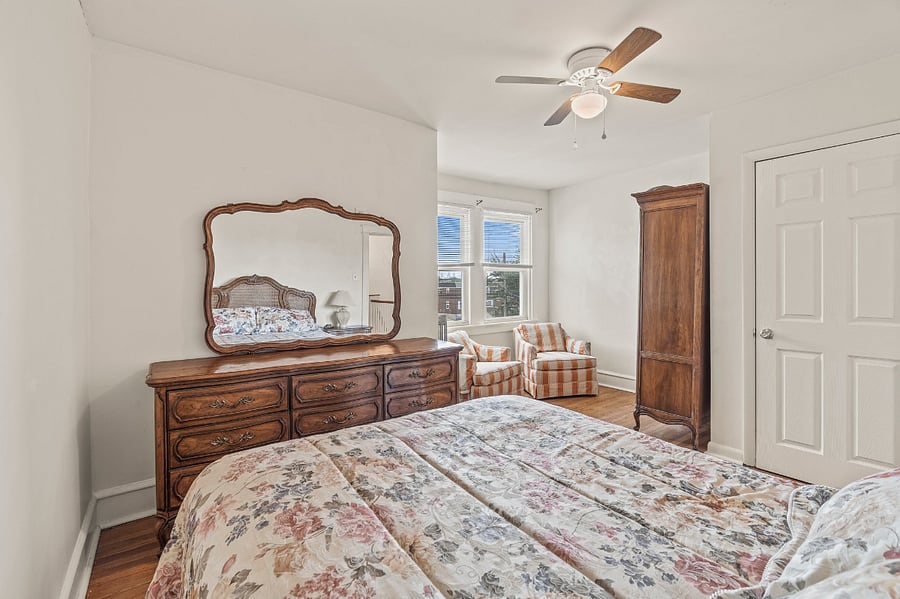 Master Bedroom with large dresser, walk-in closet and sitting area