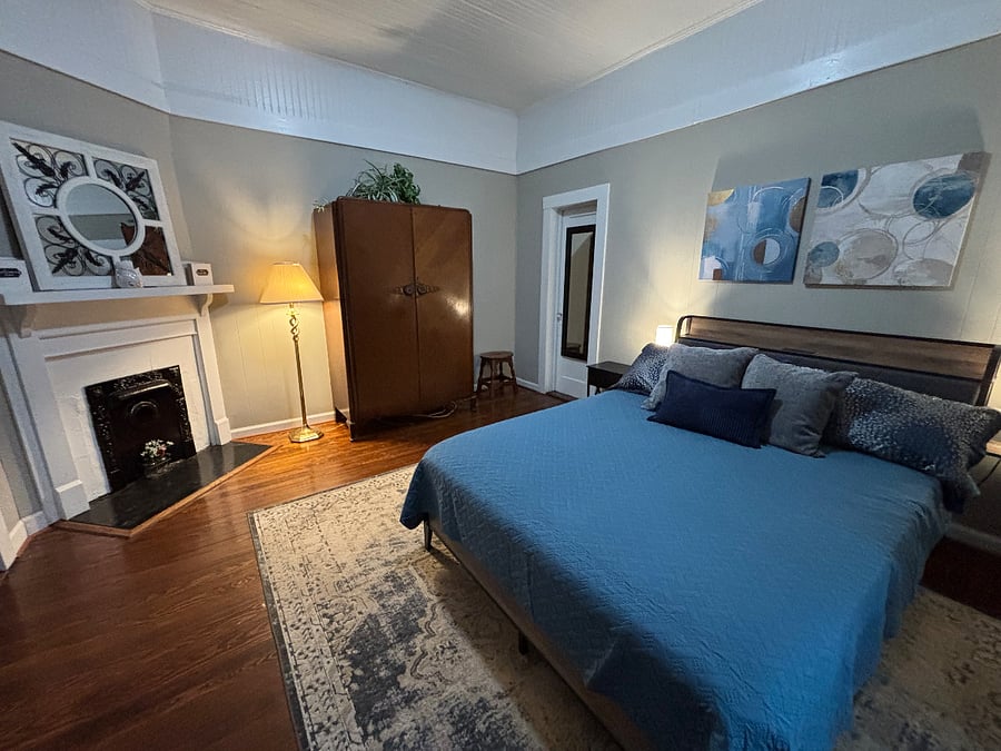 Queen side bed in the Primary bedroom.