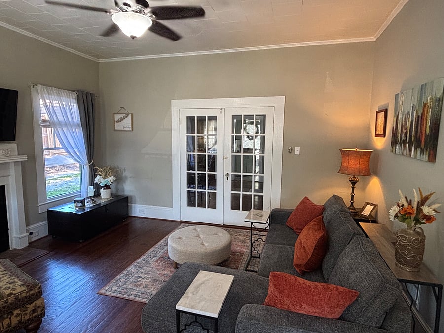 Original craftsman style French doors to the sitting room.