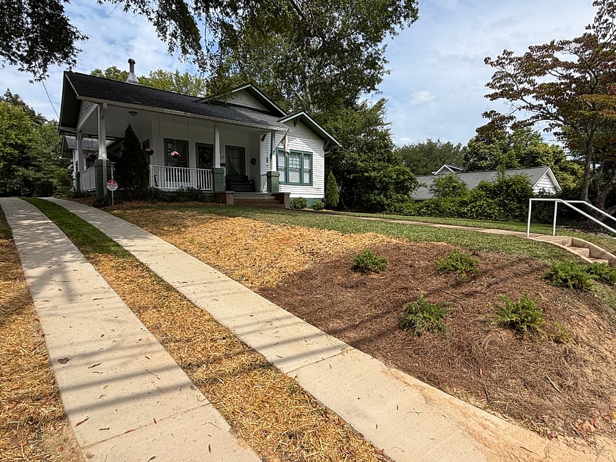 Brand new split driveway added for our Craftsman homes historic charm.