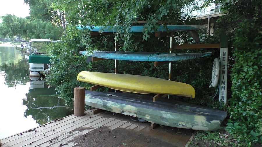 Our community dock features canoes, kayaks, and paddle boards available for complimentary checkout.