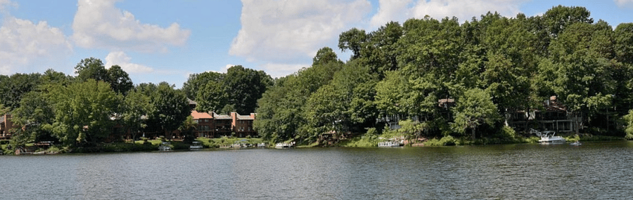 A view of the lake from the neighborhood community dock where canoes and kayaks are available for check-out.
