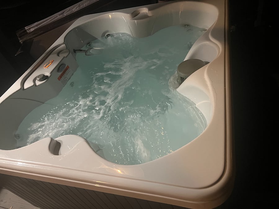 Our hot tub accessible from one of three shared decks.