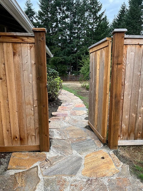 Where you would enter the backyard to access your private covered entrance.