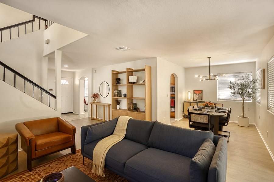Clean, bright, and beautifully furnished. You'll love coming home to this stylish space, complete with comfortable seating, built-in shelving for storage, and easy access to the kitchen. All the amenities you need for a convenient mid-term stay are right here.