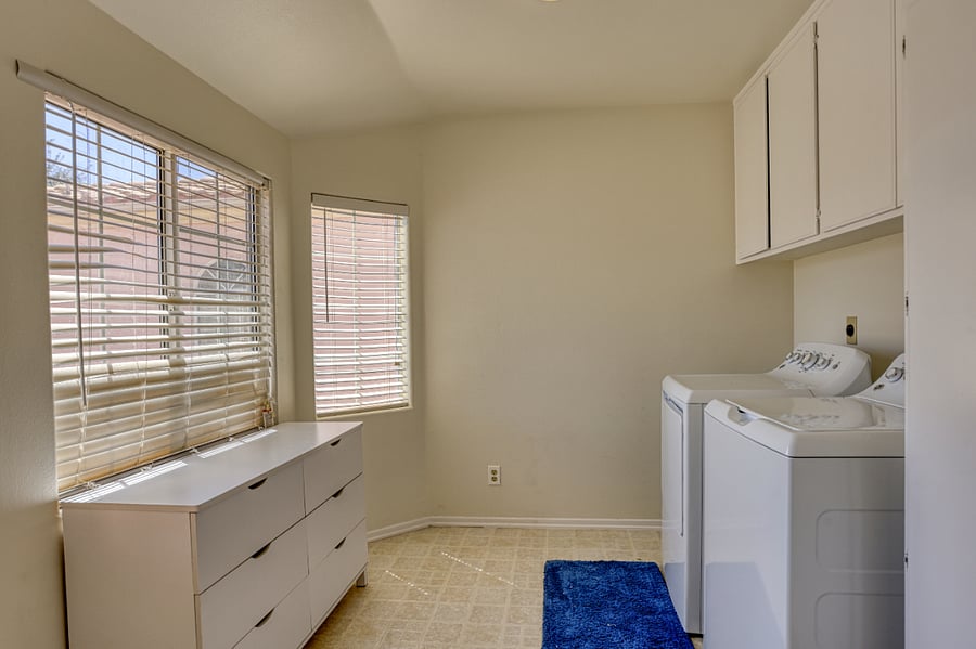 Enjoy the ease of private laundry facilities located right within the home. This bright and functional utility space is designed to make managing your wardrobe effortless during longer stays.