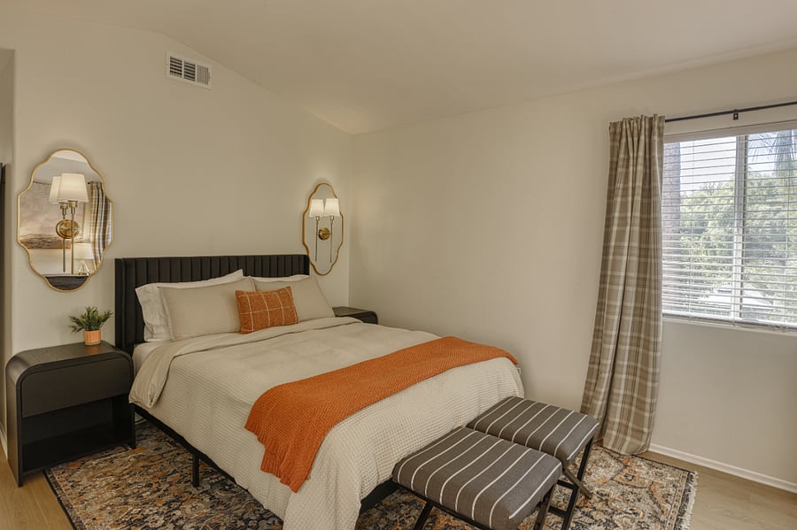 Retreat to this elegant and airy bedroom, where vaulted ceilings and high-end finishes create a true sanctuary. Designed with both style and comfort in mind, this room offers a peaceful atmosphere for a restful nights sleep.