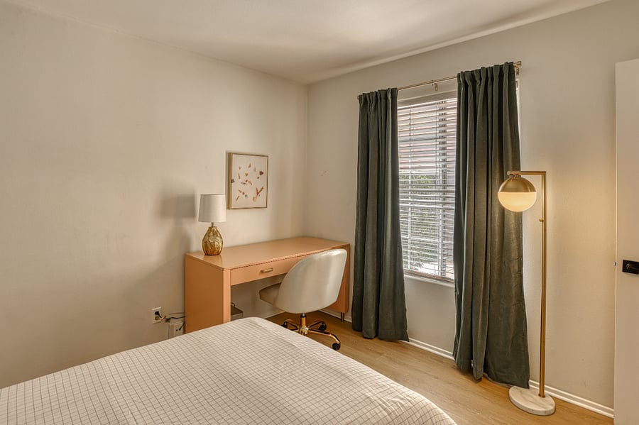 Whether you're traveling for business or just need a private spot to catch up on emails, this dedicated workspace offers a calm and productive environment. Tucked into a bright corner of the bedroom, it combines functional design with modern style.