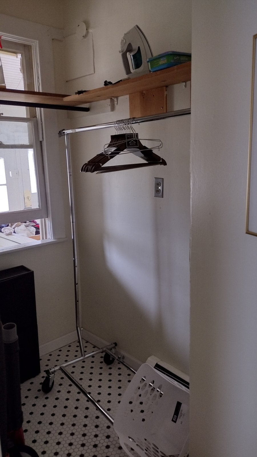 Walk in closet with plenty of storage space.