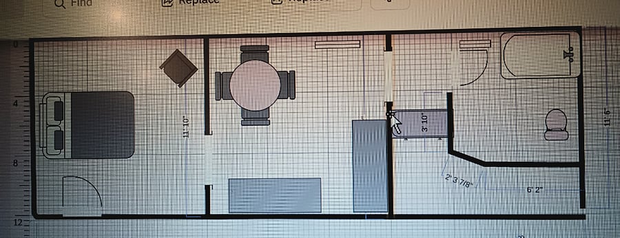 My attempt at doing an apartment layout.
It shows that this is more that a one room studio.
Living room/bedroom is separate from the kitchen. The bathroom is off the kitchen with a little nook with three large drawers for storage.
The walk in closet is off the bathroom.