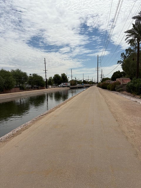 Direct access through back security gate to popular bike/walking path with a signalized crossing at 44th Street. Safeway store is accessible via the pathway approx. 3/4 miles away.