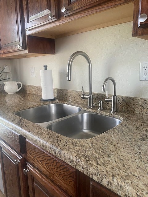 An RO water filtration system has been installed at the kitchen sink.