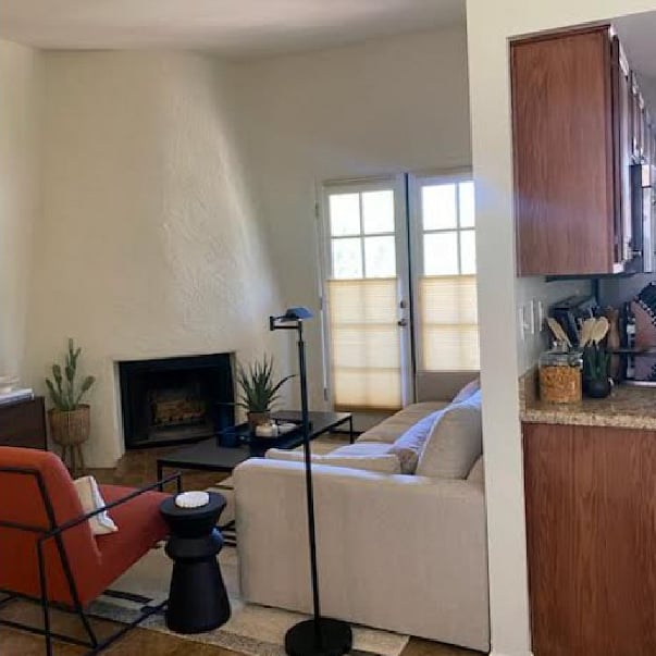 10' ceilings with southwestern wood burning Kiva fireplace