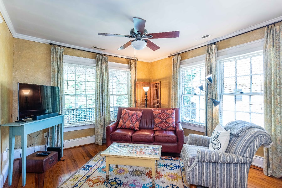 Living room
+43" TV
+Fireplace
+Large couches
+Large windows