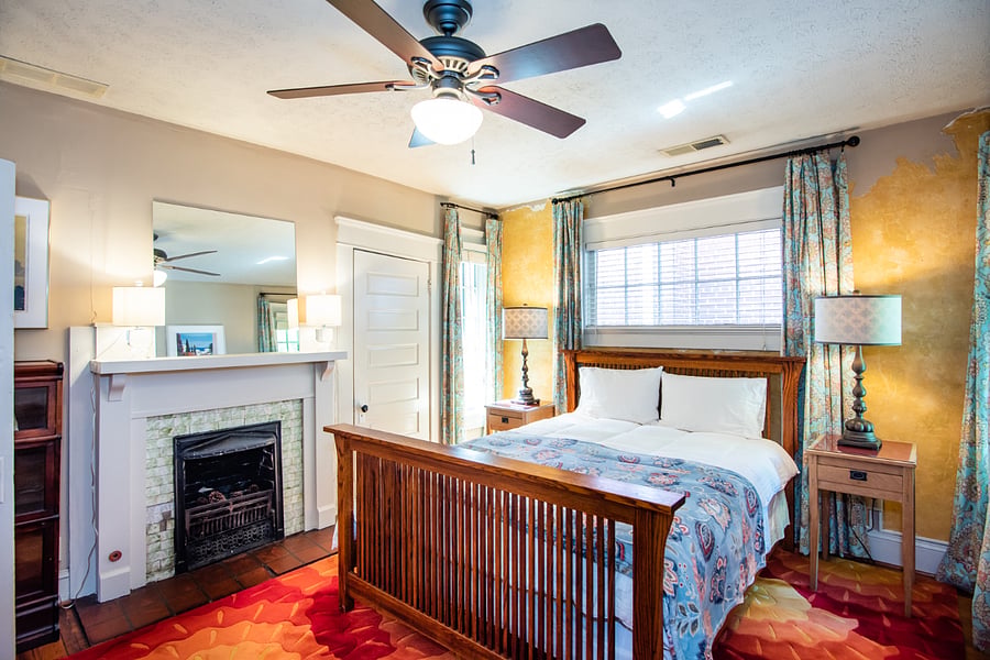 Bedroom 1:
+Queen bed
+Decorative Fireplace
+ 43" TV
+Fan / AC
+Closet + Dresser