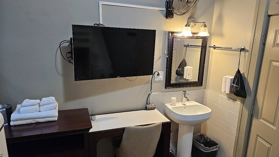 42" Samsung TV with cable TV, Desk with outlets,
Vanity sink with hand soap, lotion, hair dryer.
Plenty of Storage space with a dresser and in builds.
