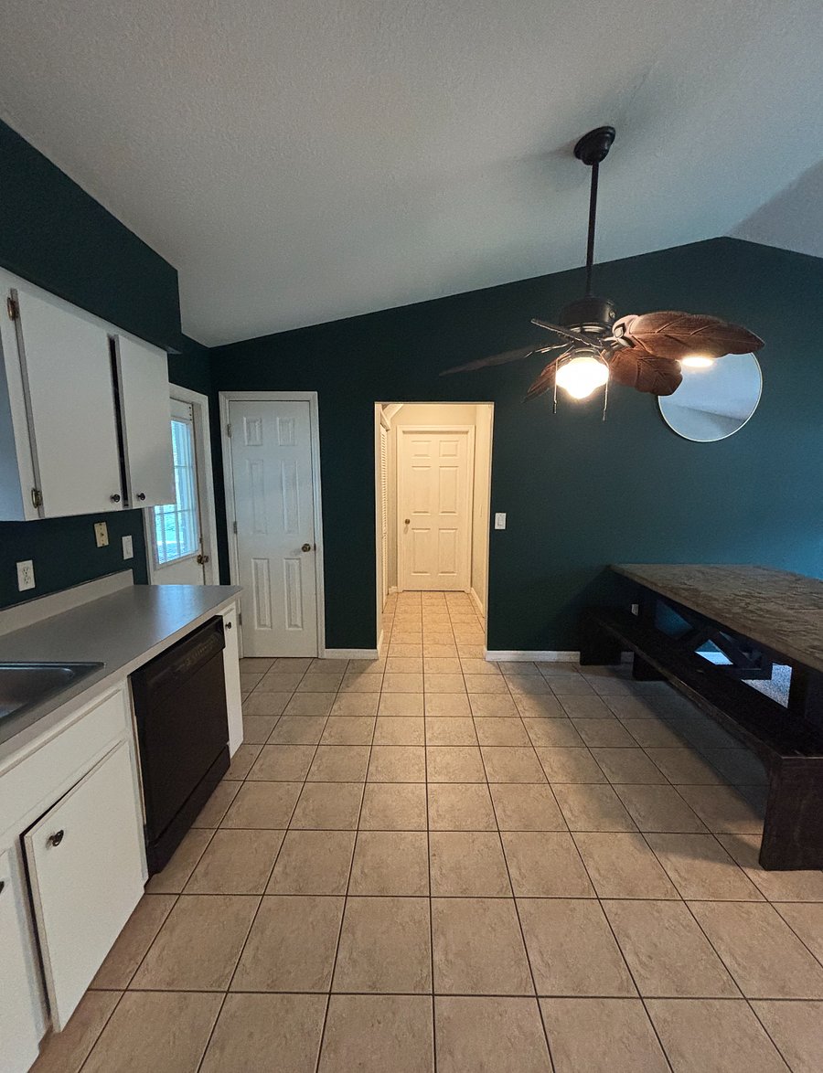 Back door entrance, hall to bedroom 1, door to laundry room and side door entrance.