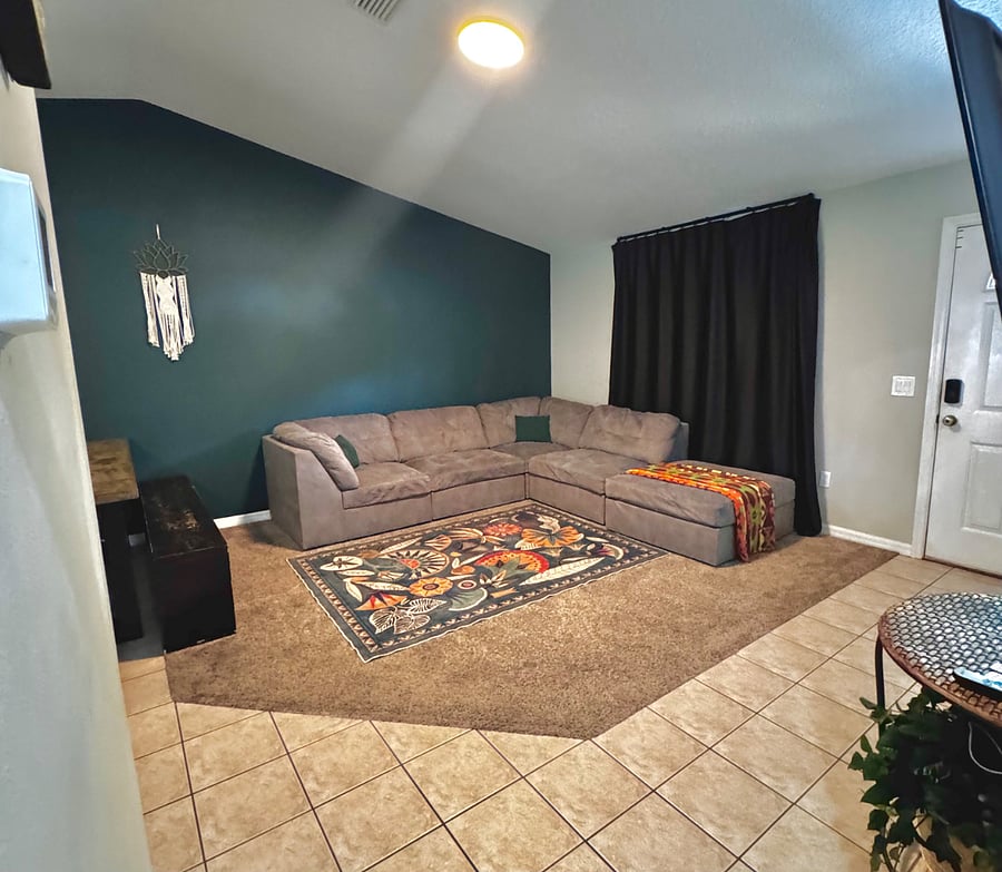 Features blackout curtains for a cozy morning vibe.