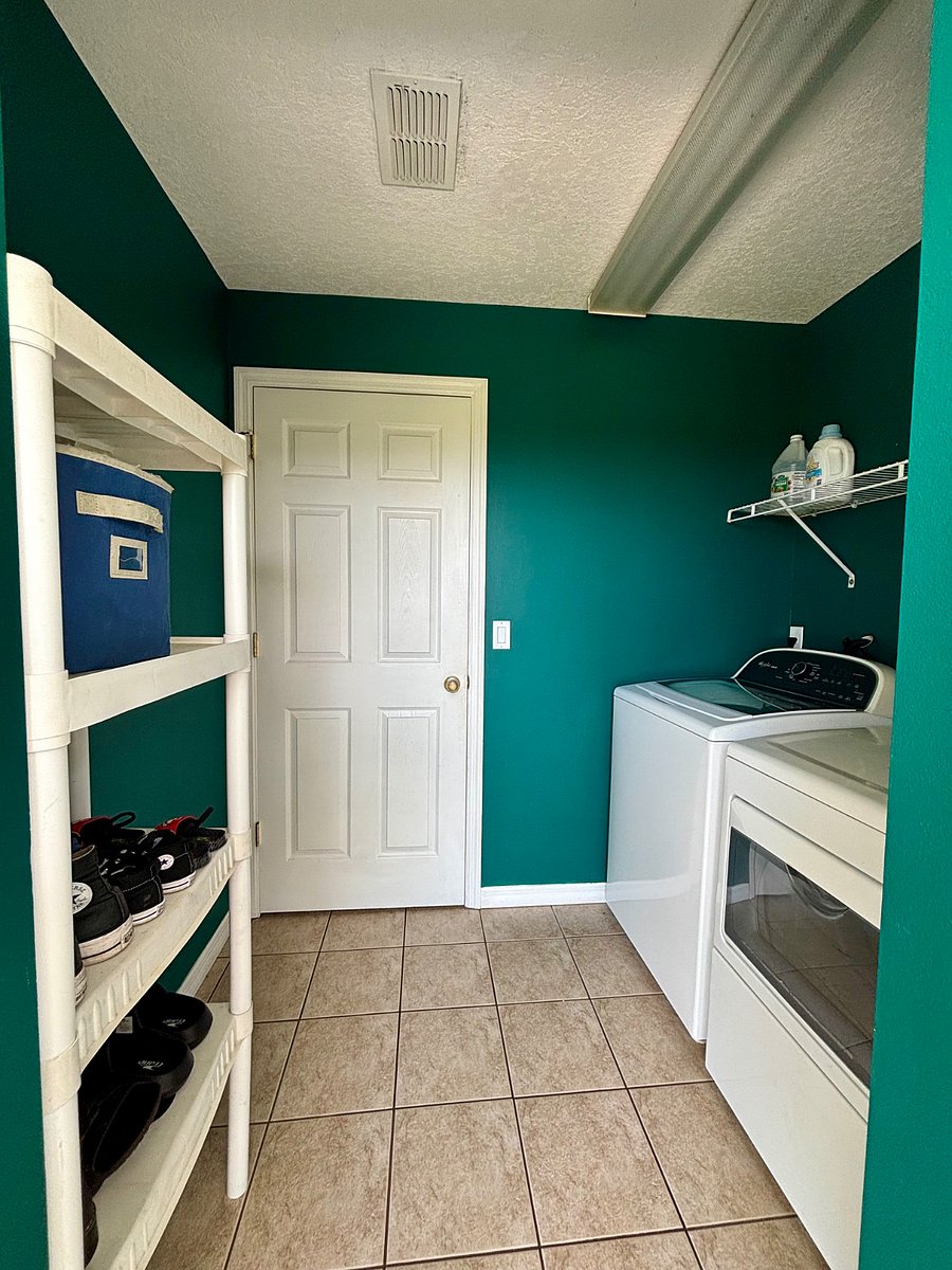 Side door entrance into laundry room.