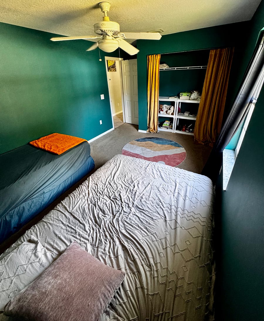 Spare Bedroom 2
Kid-Friendly Space
The closet doors have been removed and the carpet retained, creating a safe, open, and kid-friendly space.