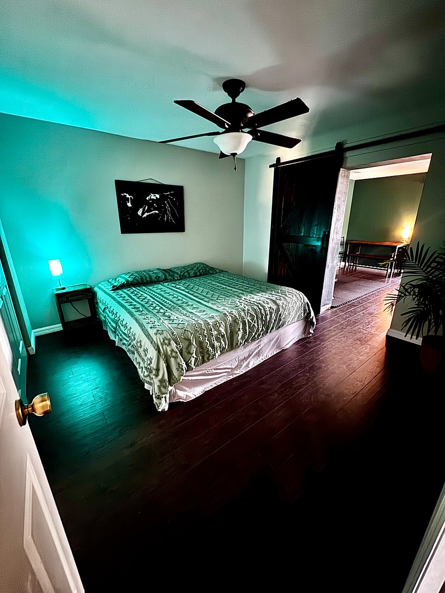 Master Suite
A cozy retreat with no windows and a large barn door, creating a dark, cool space perfect for summer nights.