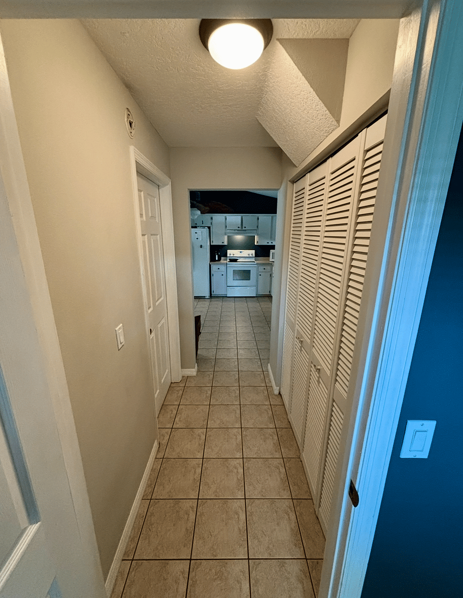 View from Laundry Room and Side Door. Door on Left is Entrance to Spare Bedroom 1