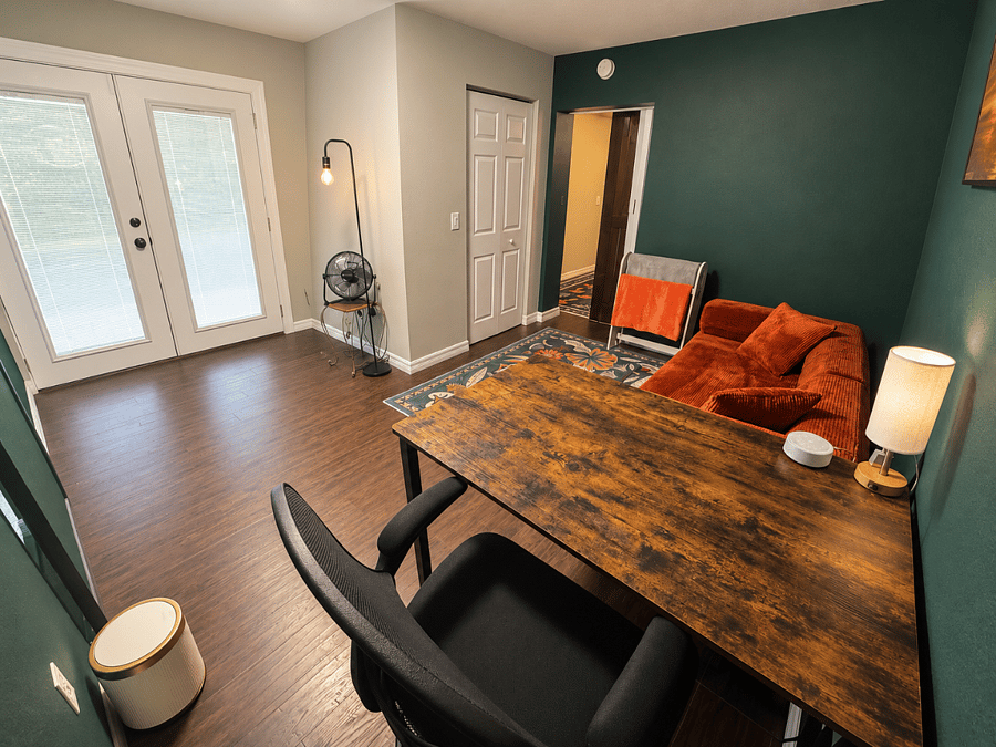 Bonus Suite with Office + Day Bed including 2 Twins- *View from Desk ft. Master Bedroom Door, Walk in Closet Door, and Exit Doors to Back Patio
