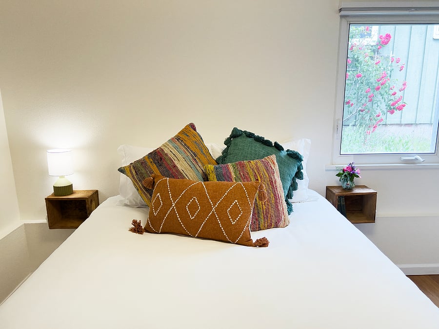 Queen bed in bedroom 1.