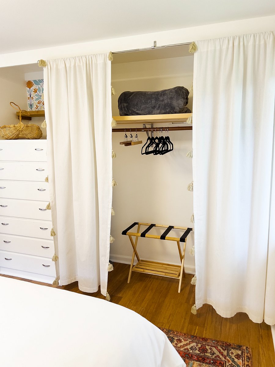 Bedroom 1's built-in storage and closet.