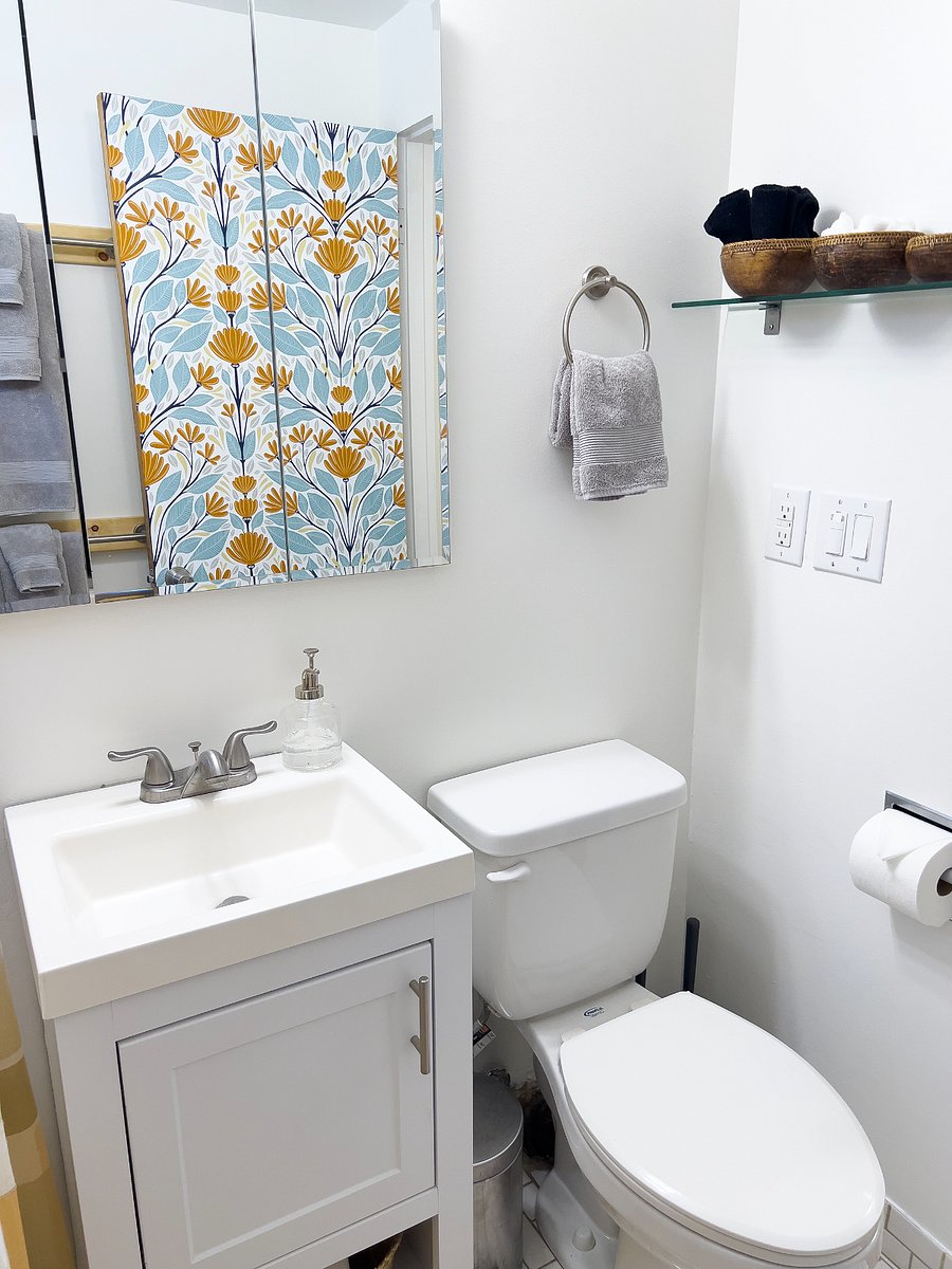 Bathroom with necessary supplies.