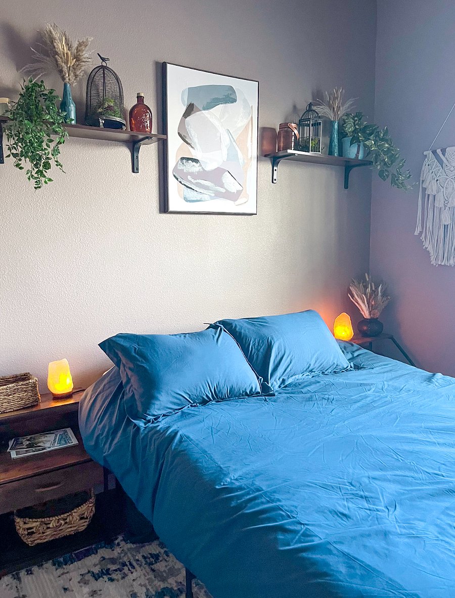 Relax into the serene atmosphere with moody salt lamp lighting on twin nightstands. Plus, enjoy the convenience of your own private, attached bathroom. 