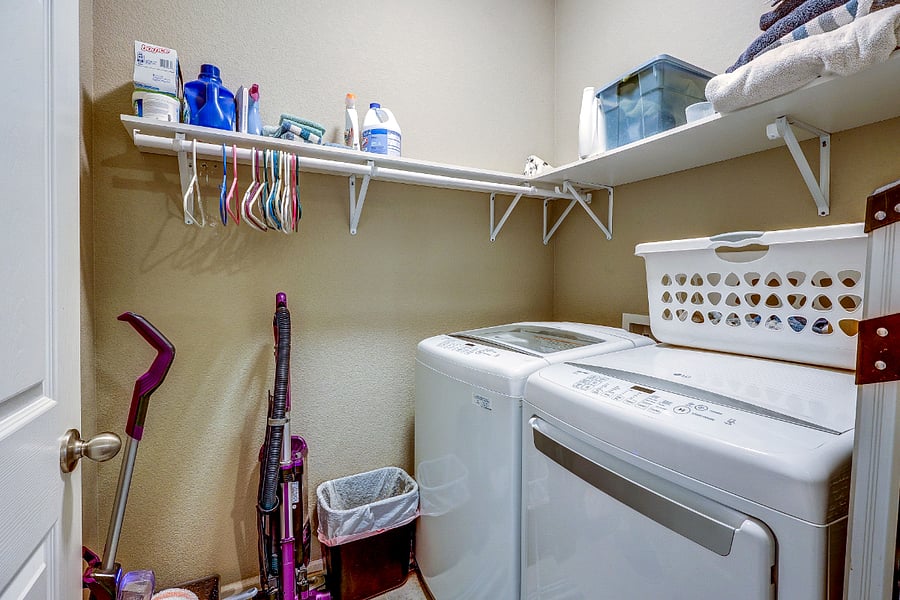 Main floor laundry with shelving!
