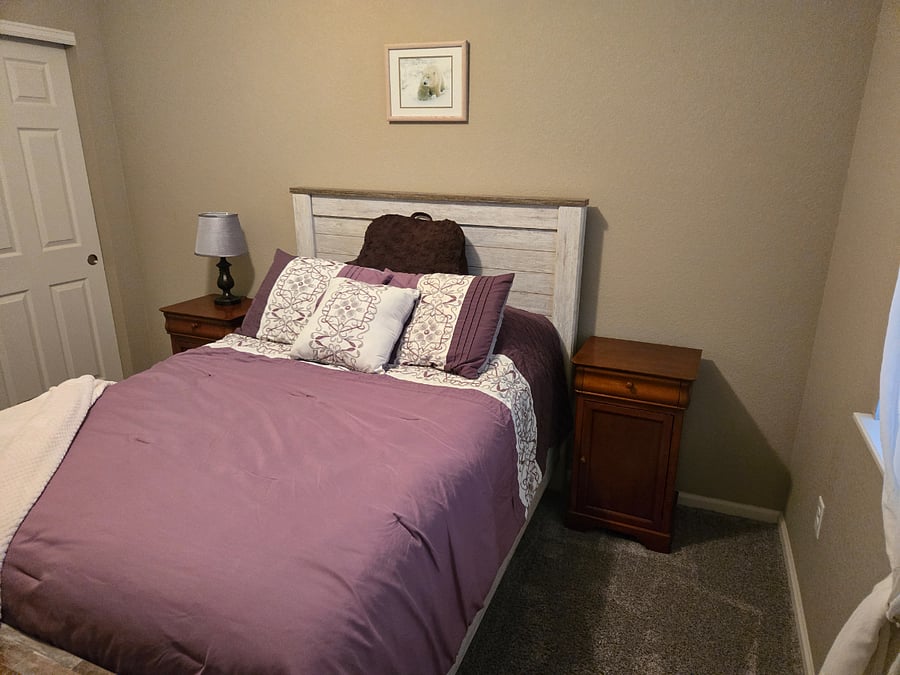Fantastic 2nd bedroom with closet, ceiling fan and blinds
