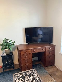 desk and smart TV