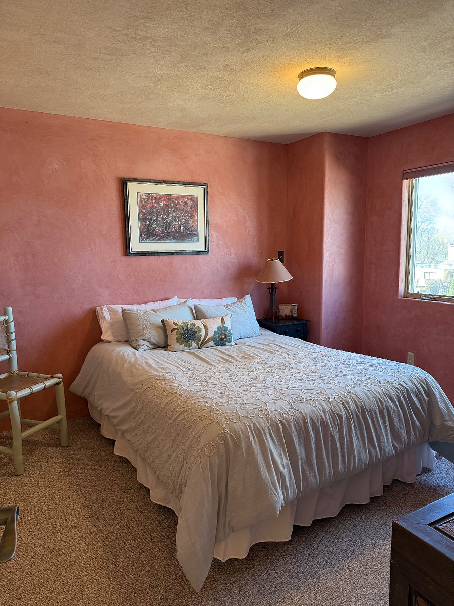 What we call the guest bedroom, which has a queen-size bed. This bedroom has plenty of storage.