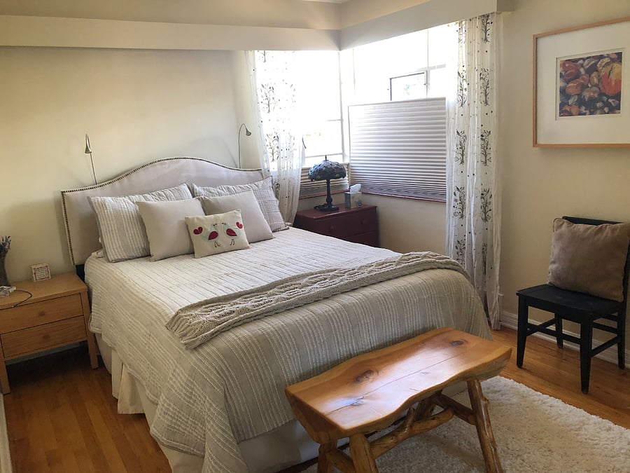 Main bedroom upstairs with great Keetsa mattress, room darkening shades, closet, dresser and nightstands.