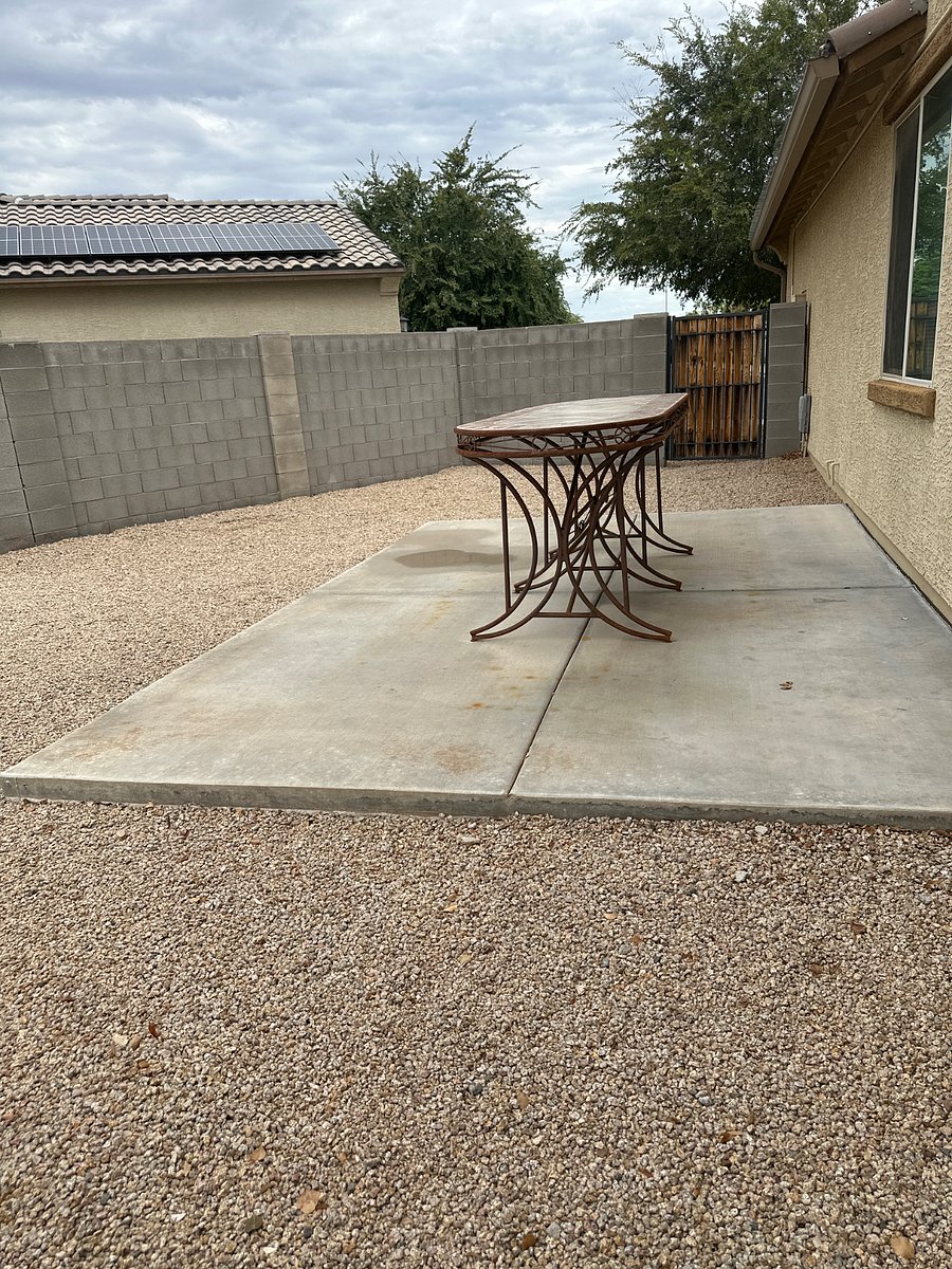 Side yard with patio table and chairs (chairs being sanded and painted tomorrow)