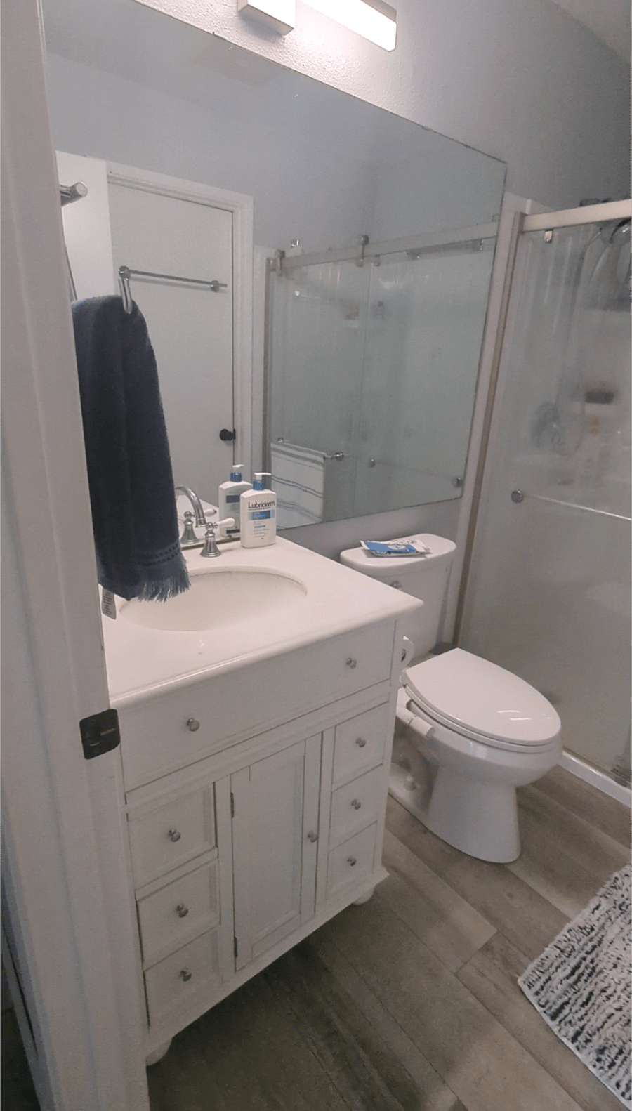The bathroom is mostly private. Your bathroom holds the only shower, so the shower would be shared. The washer dryer is in the second bathroom and will also be shared.